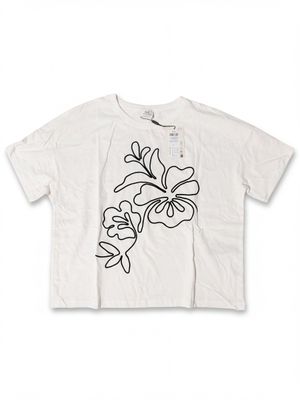 a white t - shirt with a flower design on the front