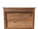 a small wooden chest with a drawer on it