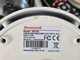 a close up of a remote control with a label on it