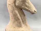 sculpture of a horse ' s head on a white background