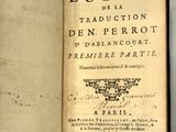 un vieux livre écrit posé sur une table
