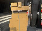 boxes stacked on top of each other on a cart in a store