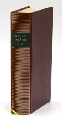 the book is brown and has a green cover on it
