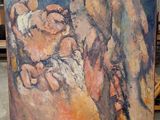 un tableau représentant un homme tenant un bébé dans ses bras