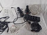 a lot of wires and cords that are on a table