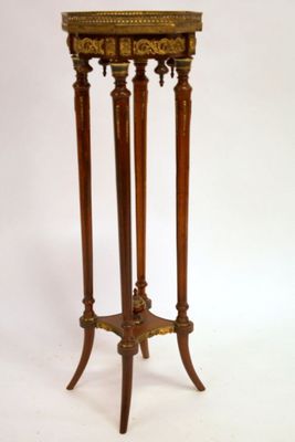 a small table with a clock on top of it
