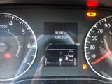 a close up of a car dashboard with various gauges and numbers
