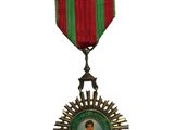 une image représentant une médaille sur laquelle figure le portrait d'une femme