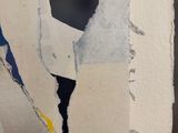 a picture of a piece of torn paper with a picture of a man on a skateboard