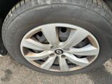 a close up view of a tire on a car