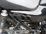 a close up of a motorcycle that is parked on the street