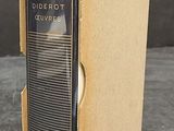 a box with a book inside of it on a table