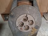 a blower that is sitting on the floor next to a box