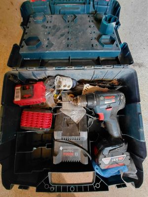 a tool box with tools in it sitting on the floor