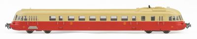 a toy train that is sitting on a white surface