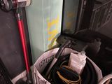 a box with a vacuum and a bag with a hose