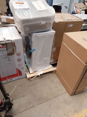 a pile of boxes and boxes sitting on the floor
