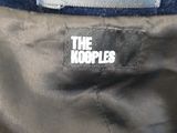 a close up of a jacket with the logo on it