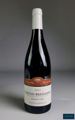 a bottle of wine that is sitting on a table