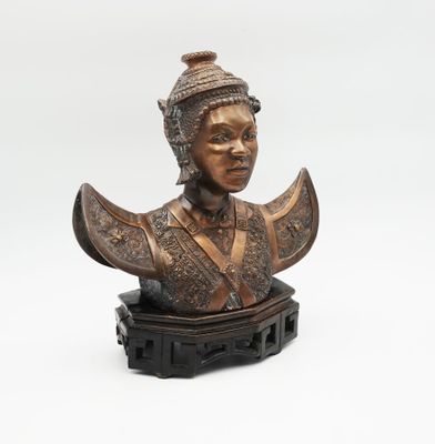 a close up of a statue of a woman wearing a hat