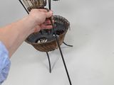 a woman that is holding a basket with baskets on it