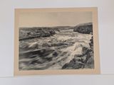 an old black and white photo of a river running through a rocky area
