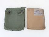 an image of a pair of bags sitting on top of a white surface
