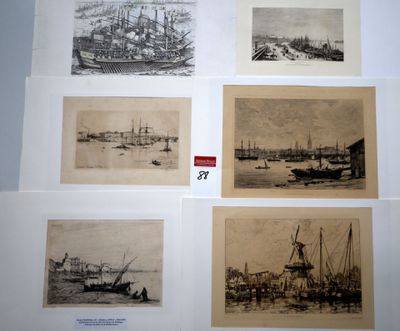 several old black and white pictures of ships on display in a museum