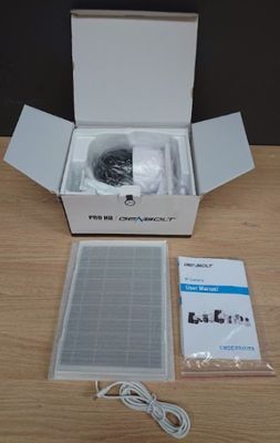 a box that has some wires in it on a table