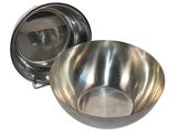 a metal bowl with a lid on a white surface