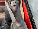 a close up view of a car ' s dashboard and steering control