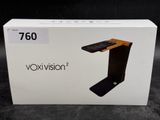 an image of a box with a phone in it sitting on a table