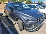 the volkswagen suv is parked in a parking lot next to other cars