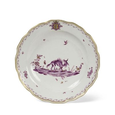 assiette violette et blanche sur laquelle est représenté un chat