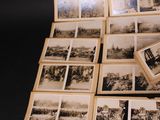 several old black and white photographs of people in a field