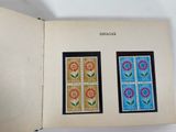 an open book with a picture of a flower and a picture of a flower on it