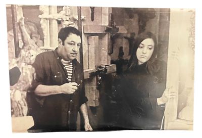 a black and white photo of a man and a woman