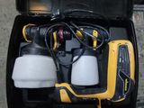 a yellow and black box with two spray bottles and a yellow and black spray bottle