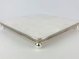 an image of a silver plate on a white background