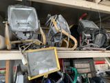 many different types of lighting on a shelf