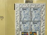 a picture of a picture of a wall with stamps on it