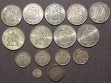 a lot of coins that are sitting on a table