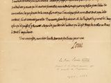 une lettre écrite à l'encre noire sur une feuille de papier