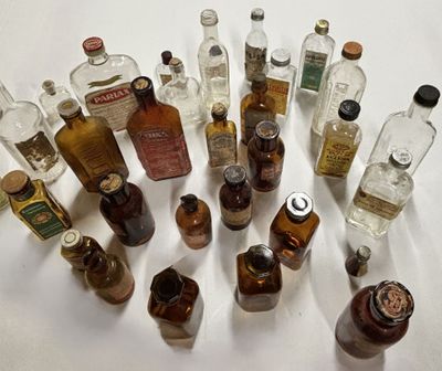 a lot of bottles that are sitting on a table