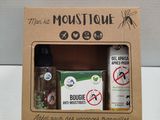 a box that has a bottle of liquid and a bottle of liquid in it