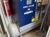 une image représentant un compresseur surmonté d'une boîte