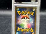 a close up of a pokemon card in a clear plastic holder