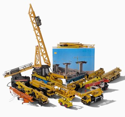de nombreux engins de chantier qui sont à l'arrêt sur le terrain