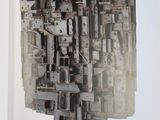 an open book with a picture of a sculpture on it