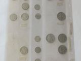 a lot of coins that are in a plastic bag